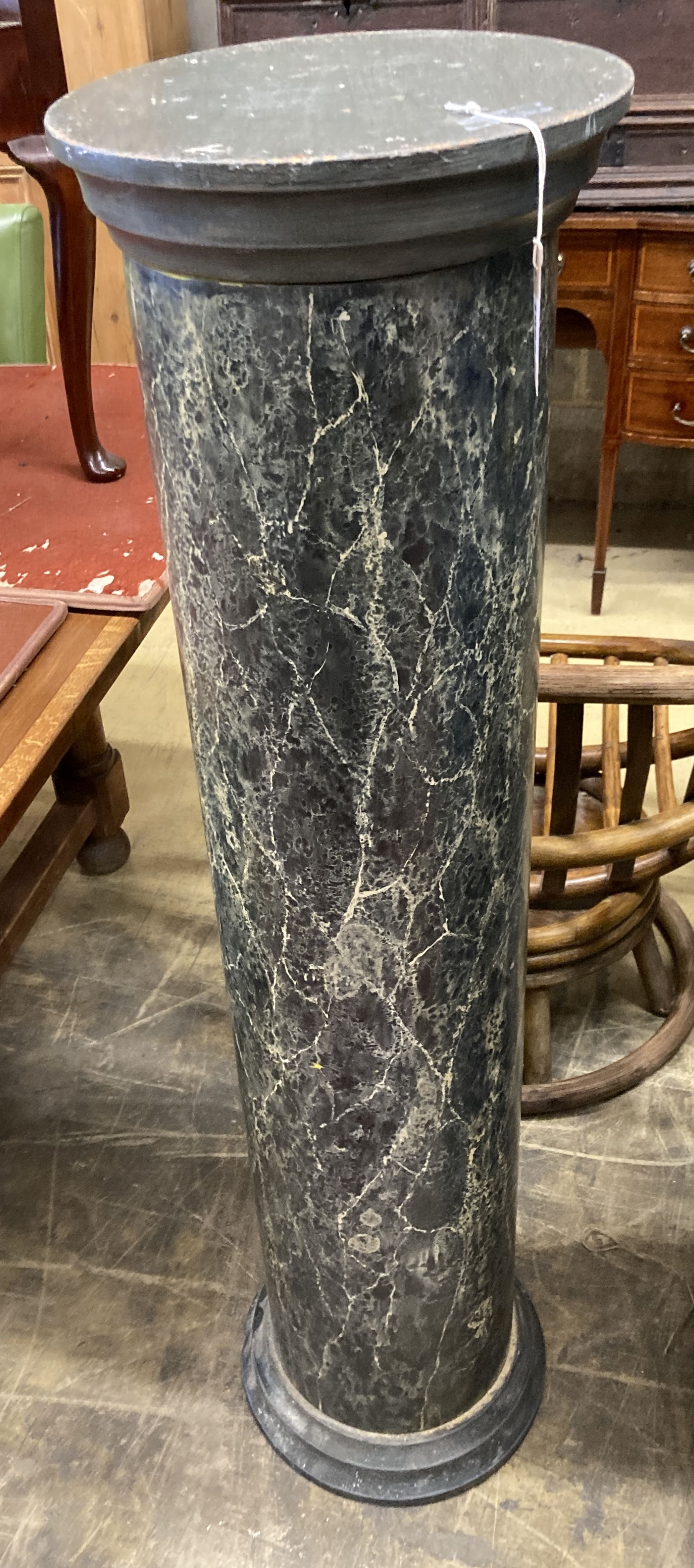 A painted faux marble pedestal, height 124cm